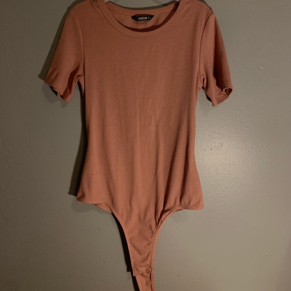 Women rose pink bodysuit